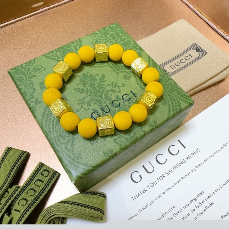 G*u*i bracelets